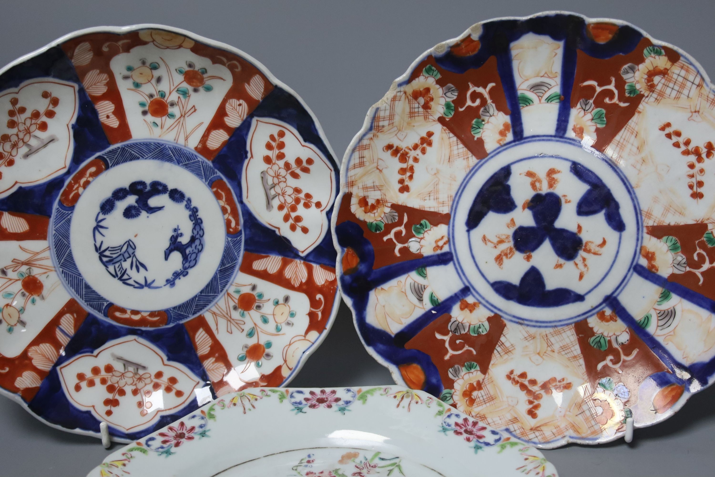A Chinese Qianlong ‘double peacock’ octagonal plate, 21.5cm and two Imari dishes